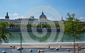 Rhone river with Grand Hotel Dieu after 2018 renovation in Lyon France