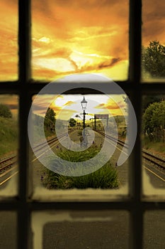 Rhyd Ddu railway station through a window at sunset. Part of the Welsh Highland Railway in the Eryri National Park