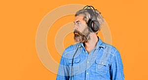 Rhythm concept. Man bearded hipster headphones listening music. Hipster enjoy excellent sound song in earphones