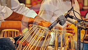 Musicians Playing Rhythm Instruments Tabla and Dholak in a Indian Music Concert. photo