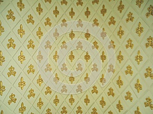 Rhythmic gold ornament, yellow background