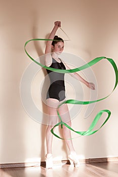 Rhythmic gymnastics. Graceful ballerina in motion