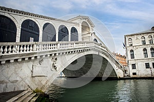 Rialto bridge across the Grand Canal Venice