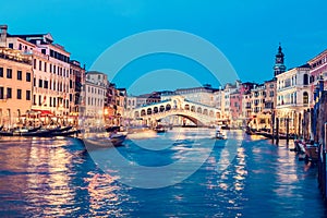 Rialto bridge and Grand Canal in Venice, Italy at night