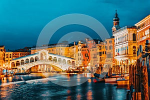 Rialto Bridge Ponte di Rialto or Bridge of Sighs and view of the most beautiful canal of Venice - Grand Canal and boats,