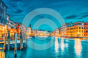 Rialto Bridge Ponte di Rialto or Bridge of Sighs and view of the most beautiful canal of Venice - Grand Canal and boats,