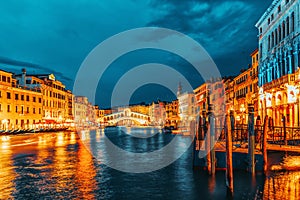 Rialto Bridge Ponte di Rialto or Bridge of Sighs and view of the most beautiful canal of Venice - Grand Canal and boats,