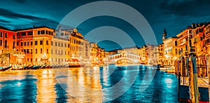 Rialto Bridge Ponte di Rialto or Bridge of Sighs and view of the most beautiful canal of Venice - Grand Canal and boats,