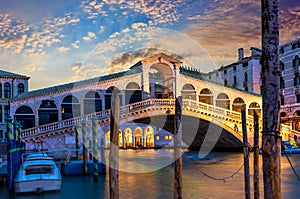 The Rialto bridge in Venice, panorama at sunrise, Italy