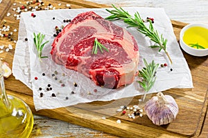 Rib eye fresh meat steak on chopping board