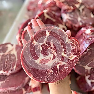 Rib-eye. Meat that has been cut into perfectly sized pieces in a circle shape. Suitable for steak.