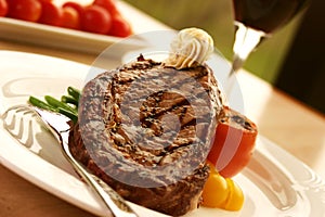 Rib Eye Steak served with wine