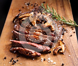 Rib eye steak sliced with shitake mushrooms, peppercorns and sea salt