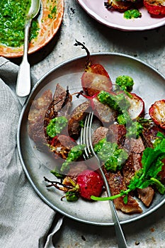 RIB-EYE STEAKS WITH RADISH GREENS CHIMICHURRI SAUCE.style rustic.