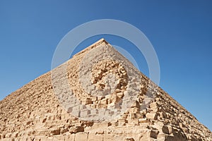 Rib and faced top of  Pyramid of Khafre also read as Khafra, Khefren or of Chephren is the second-tallest and second-largest of photo