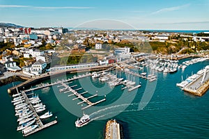Ribadeo city and harbor with moored vessels. Northern Spain photo
