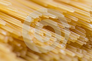 Ribbed dry yellow macaroni with periodic line