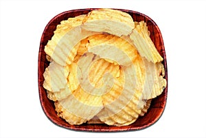 Ribbed potato chips in a bowl