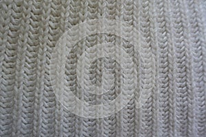 Ribbing pattern on white knitwork vertical wales