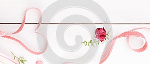 Ribbon magic hearts on wooden backround, Valentine day concept, banner