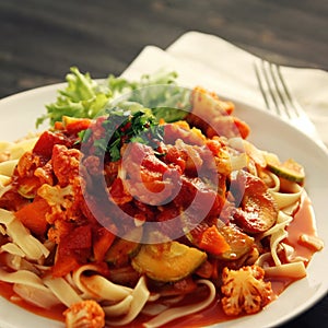 Ribbon pasta with Arrabiata sauce. Vegetarian dish