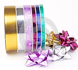 Ribbon reel with colorful ribbons and bows