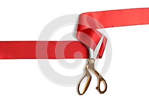 Ribbon and scissors on white background