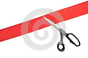 Ribbon and scissors on white background, top view