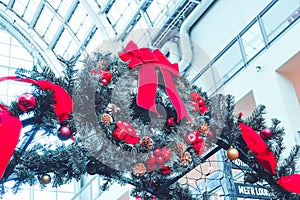 Ribbon tied on Christmas tree for archway