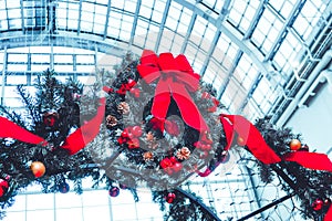 Ribbon tied on Christmas tree for archway