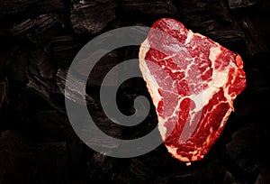 Ribeye steak over hot coal