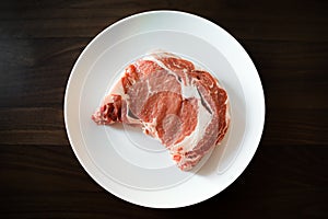 Ribeye Steak on a White Plate