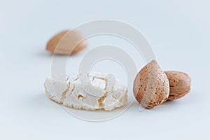 Ricciarelli of Siena with almonds, typical Italian cookies on white background