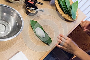the rice is on the bamboo leaf. photo
