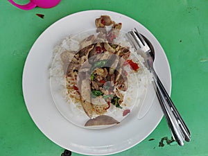 The Rice with basil and chicken entrails photo