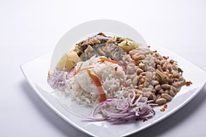 seco de cabrito peruvian food,rice with beans photo