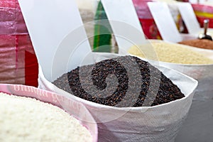 Rice Berry,Black kernel fragrant rice in the sack,Khao Hom Mali, Riceberry Brown Rice in the market,department store,Raw grain,