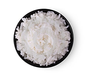 Rice in a black bowl on a white background