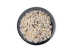 Rice in a black plate on a white background