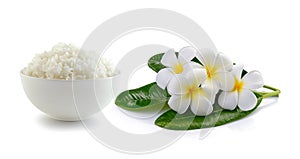 Rice in a bowl and Glass of water on white background