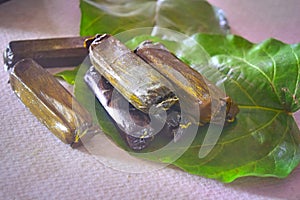 Rice cake in banana leaves (moron or muron) photo