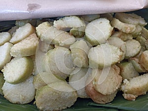 Rice cake slices. A typical Indonesian food made from rice and wrapped in oisang leaves.