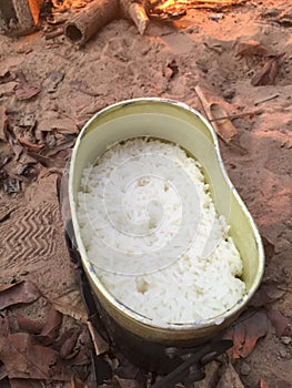 Rice in camp pot after cooking on sand