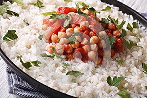 Rice with chickpeas and herbs close up horizontal