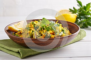 Rice cooked with vegetables, herbs and spice. Vegan cuisine. Healthy vegetarian food concept