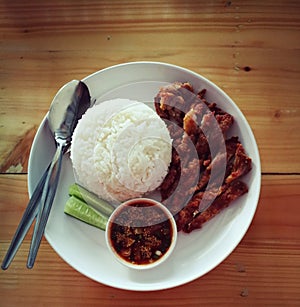 Rice with crispy pork and native source delicious favorite foods