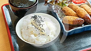 Rice, deep fried chicken tenderloin with Japanese curry, and soup