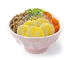 Rice don with natto, tobiko egg and pickled radish in soy sauce japan