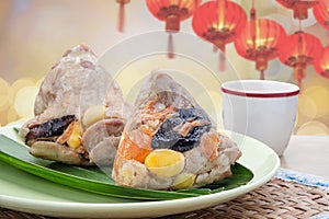 Rice dumplings or zongzi with tea Traditional Chinese food