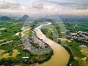 Rice fields divided by river in Guangxi province, China